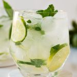 Alcohol-free mojito mocktail with sparkling water, lime juice, and mint leaves