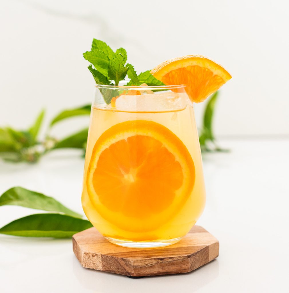 easy non alcoholic orange drink with citrus slices