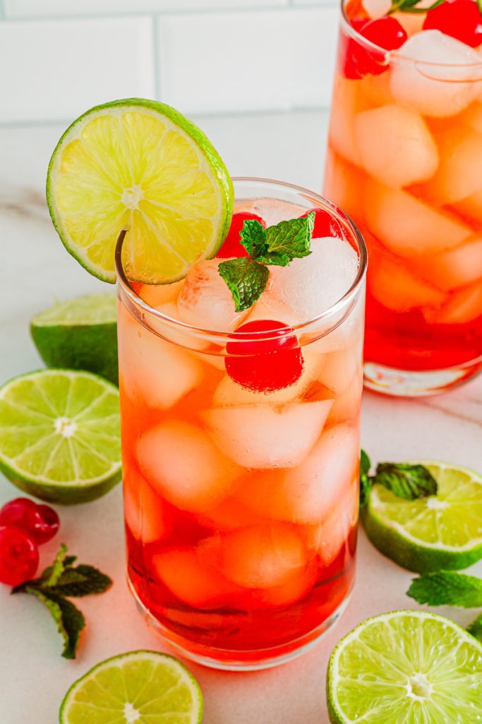 Glass of Shirley Temple Mocktail with marachino cherries