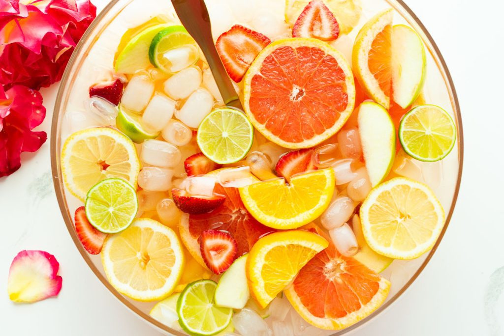 glass punch bowl full of mocktail sangria for wedding shower