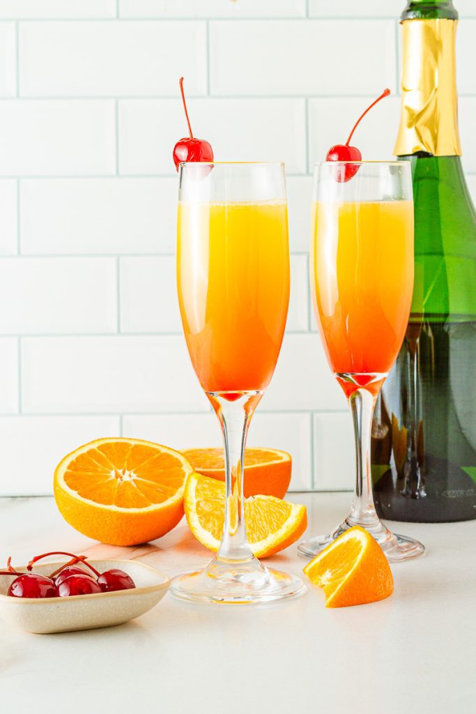 Top your Sunrise Mocktail with cherries