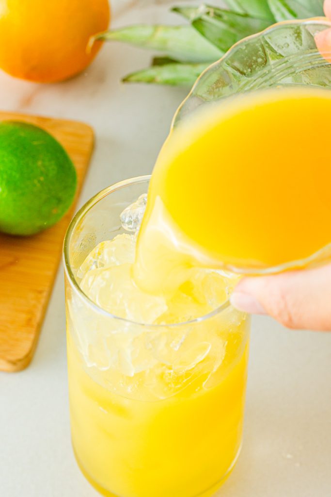 Add lime juice to non-alcoholic sunrise