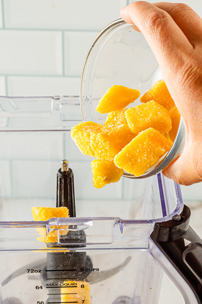 adding mango to mango mocktail recipe