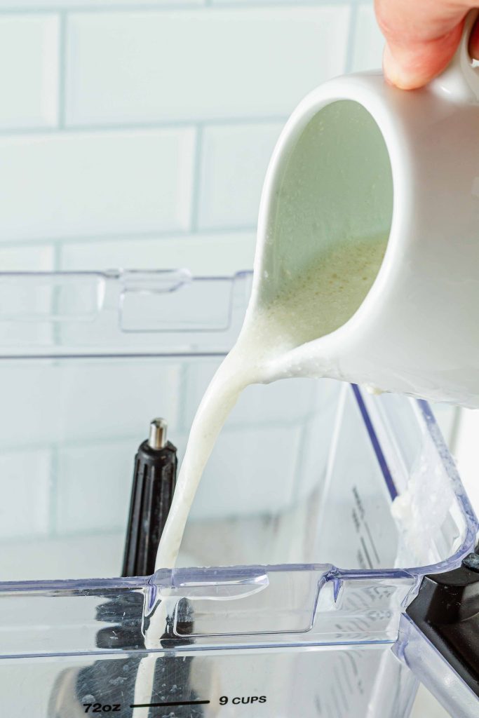 Pouring lime juice into blender