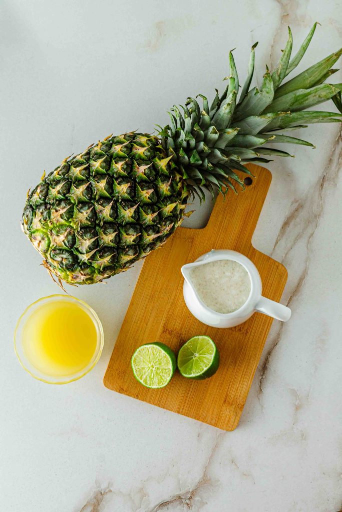 Pineapple, Lime, Pineapple Juice and Coconut Milk for Virgin Pina Colada