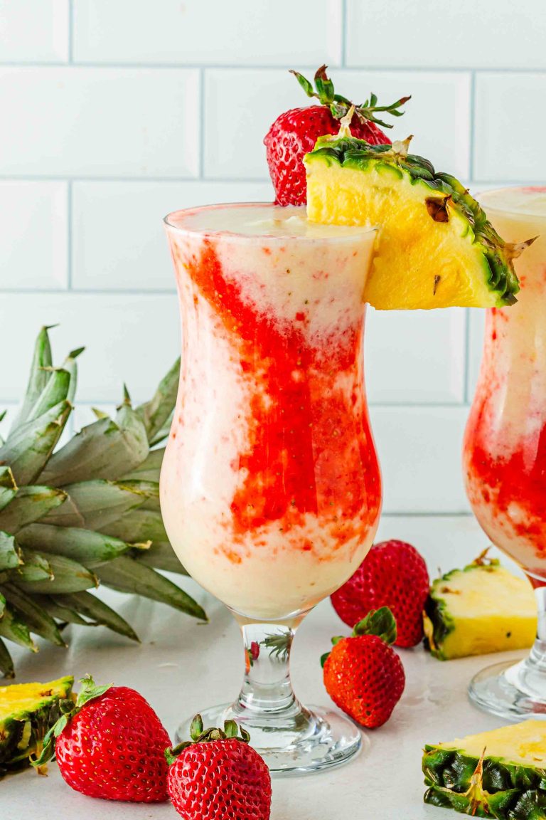 tall glass of strawberry pina colada lava flow mocktail