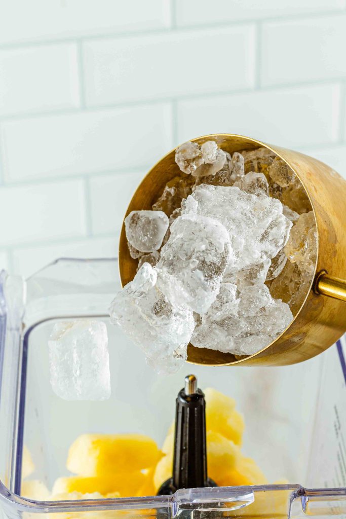 Add ice to blender for Virgin Strawberry Colada
