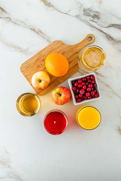 Cranberries, Apples, ginger ale and orange juice for non-alcoholic holiday punch 