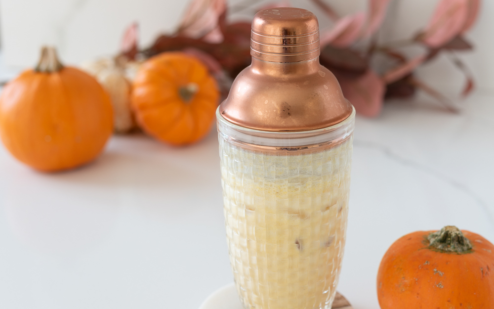 Cocktail Shaker full of alcohol free Holiday Mocktail Pumpkin Eggnog