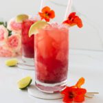 Pink Mocktail with fresh flowers and citrus