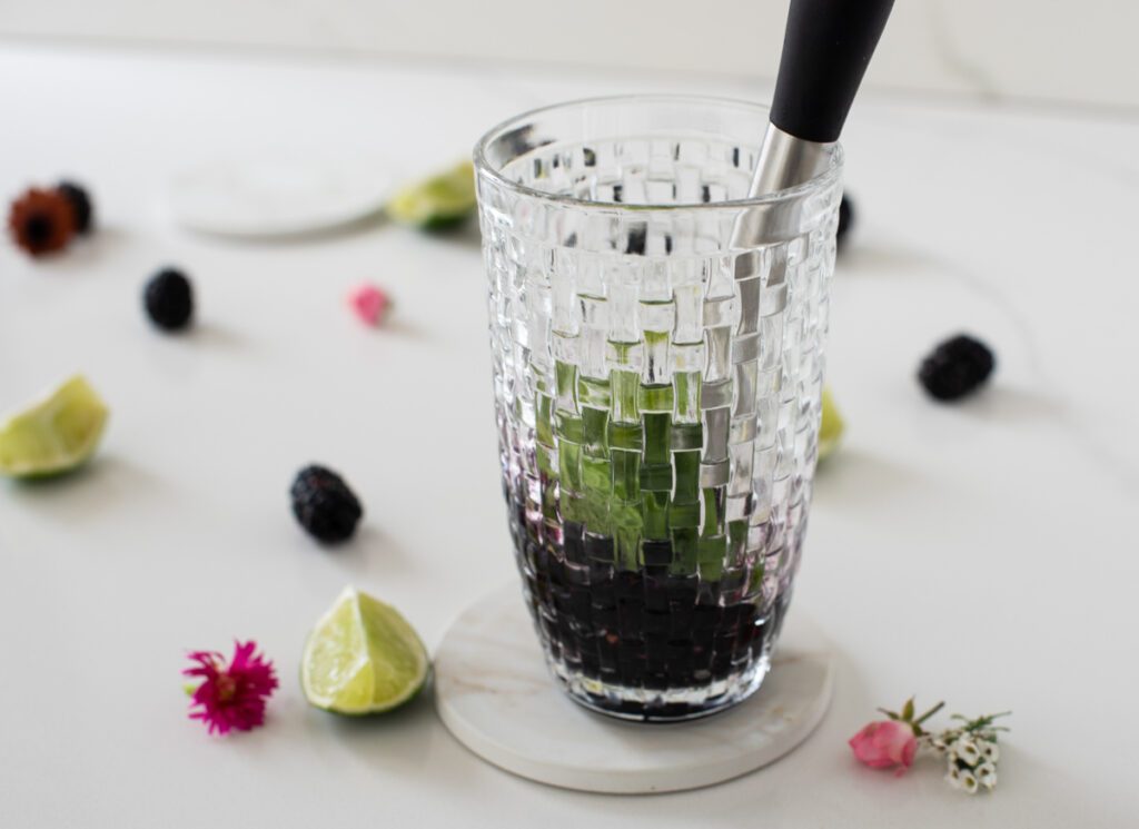 muddling blackberry mojito ingredients 
