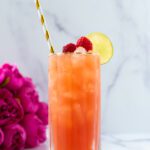 Raspberry mocktail with fresh flowers