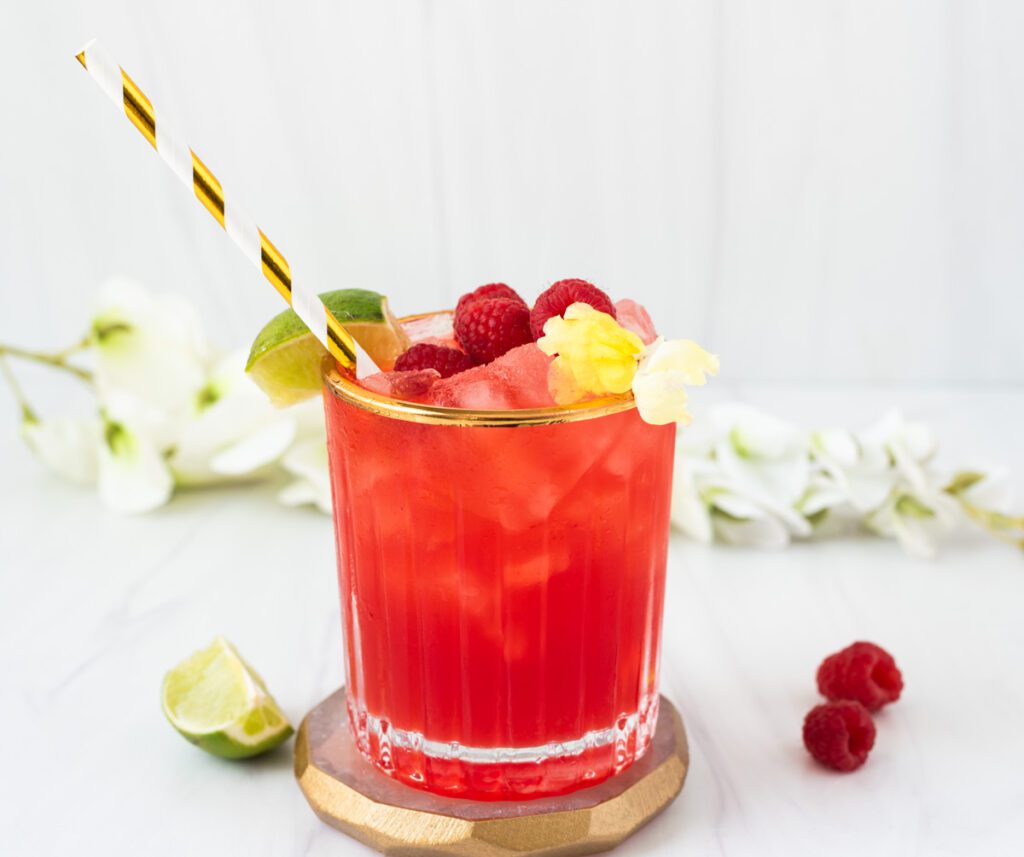 glass of virgin raspberry margarita mocktail 