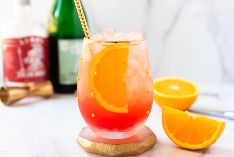 Glass of Aperol Spritz Party Mocktailk with oranges