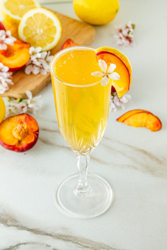 peach bellini mocktail with fresh blossoms
