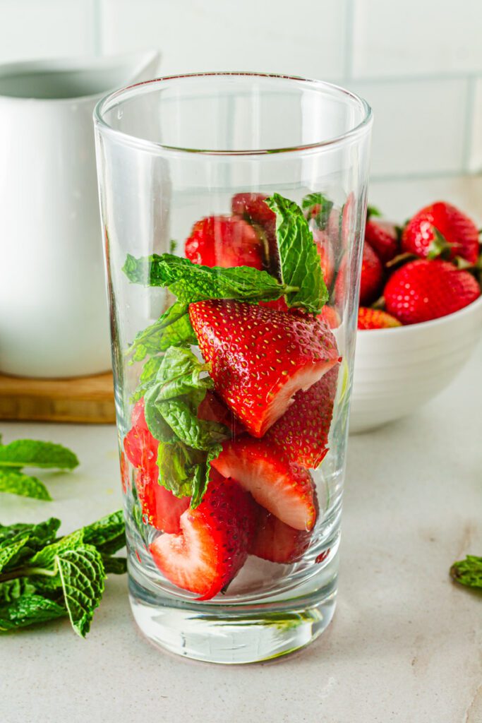 Add strawberry's to glass