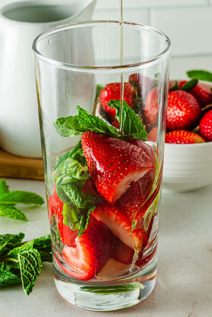 Add syrup to glass